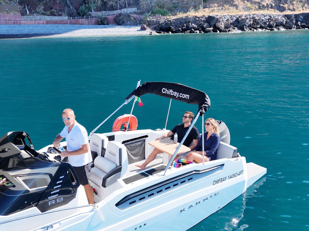 The Chifbay boat at anchor in turquoise water